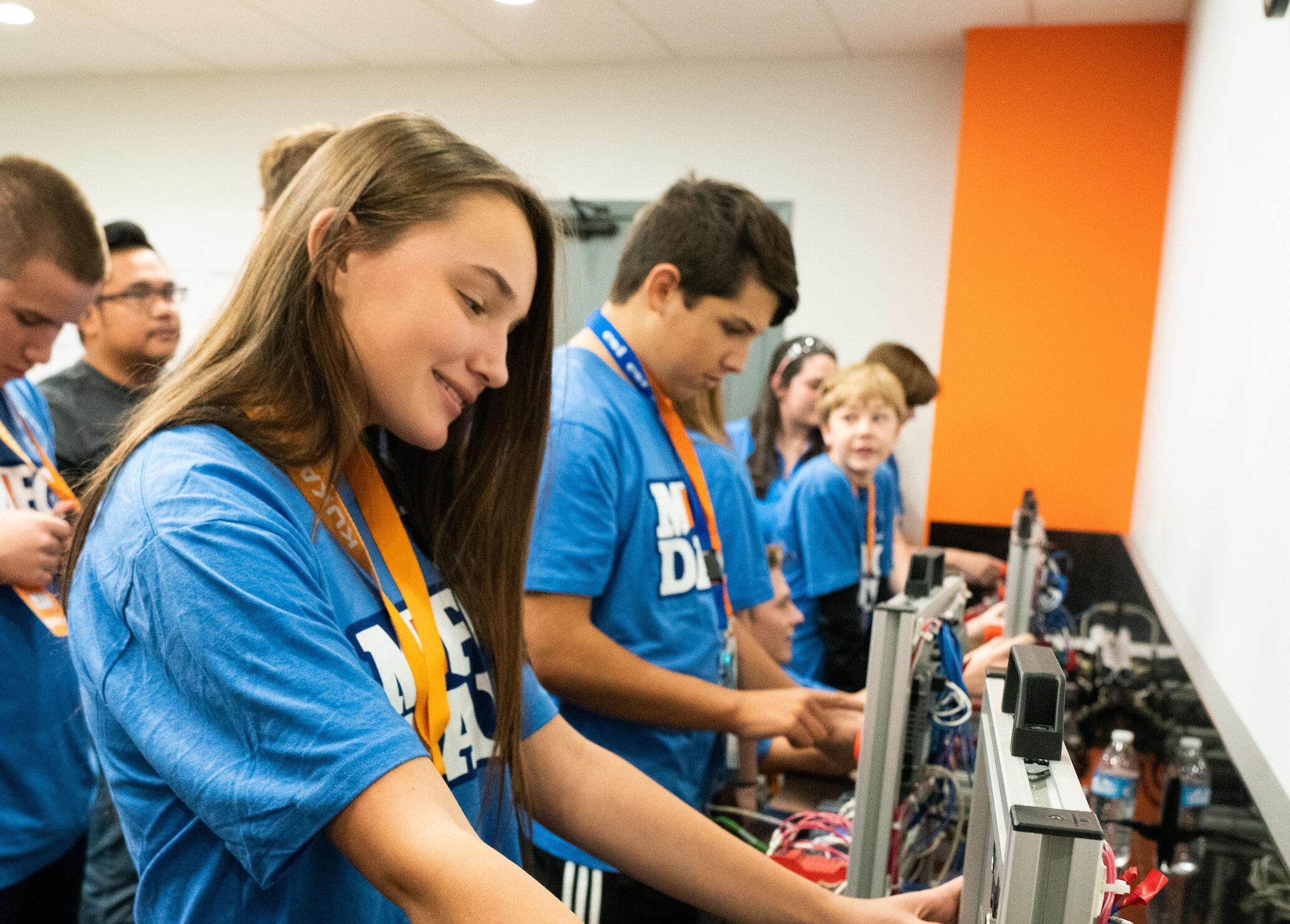 MFG Day students look at manufacturing equipment